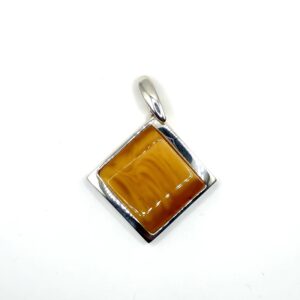 Zilveren hanger met honing-amber